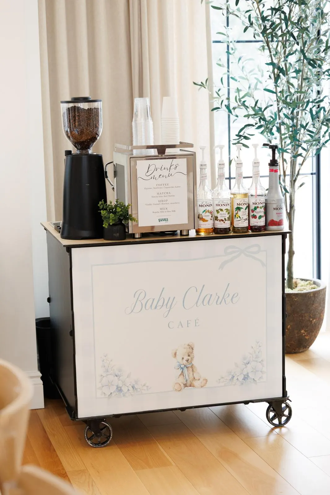Qahwa Bar espresso cart serving guests at Baby Clark