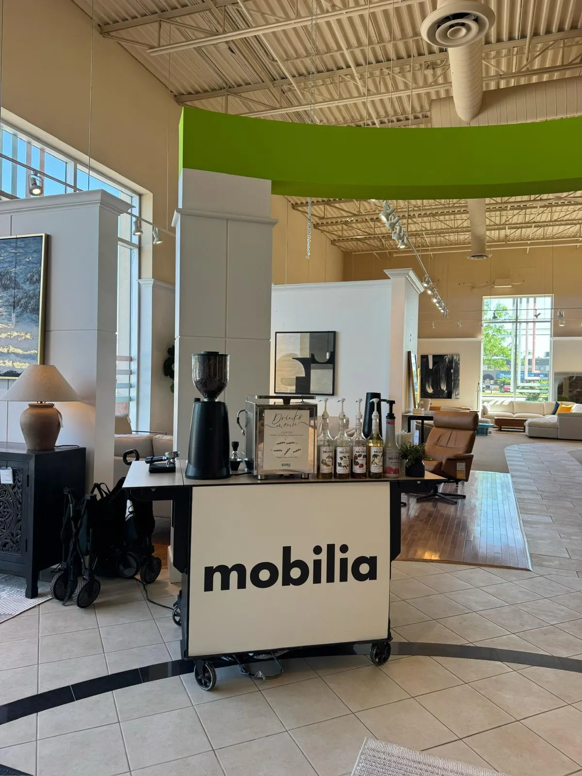 Qahwa Bar espresso cart serving guests at Mobilia